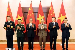 Министры иностранных дел, обороны и общественной безопасности Вьетнама и Китая на первом совещании в рамках стратегического диалога «3+3». Фото: ВИА