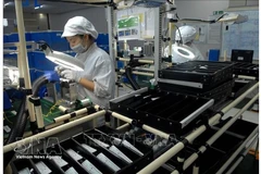 Производственная линия по выпуску электронного оборудования и осветительных приборов для автомобилей и мотоциклов на предприятии ООО "Stanley Electric Vietnam" (японские инвестиции) в Ханое. Фото: ВИА