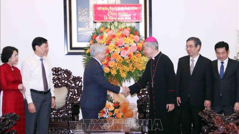 Руководители Партии и Государства поздравили католиков с Рождеством ảnh 1