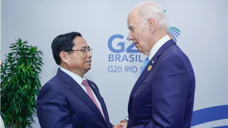 Премьер-министр Вьетнама Фам Минь Тьинь и Президент США Джо Байден. Фото: Нят Бак