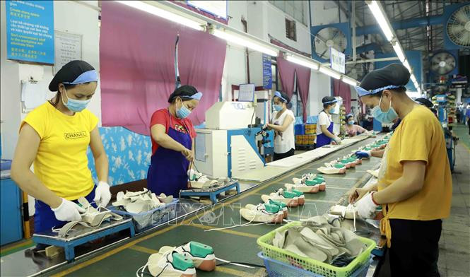 Обувь является одним из основных видов вьетнамских экспортных товаров. Фото: ВИА Обувь является одним из основных видов вьетнамских экспортных товаров. Фото: ВИА