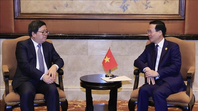 Президент Во Ван Тхыонг и Председатель компании Чжунсин (ZTE) Ли Цзысюэ. Фото: ВИА Президент Во Ван Тхыонг и Председатель компании Чжунсин (ZTE) Ли Цзысюэ. Фото: ВИА