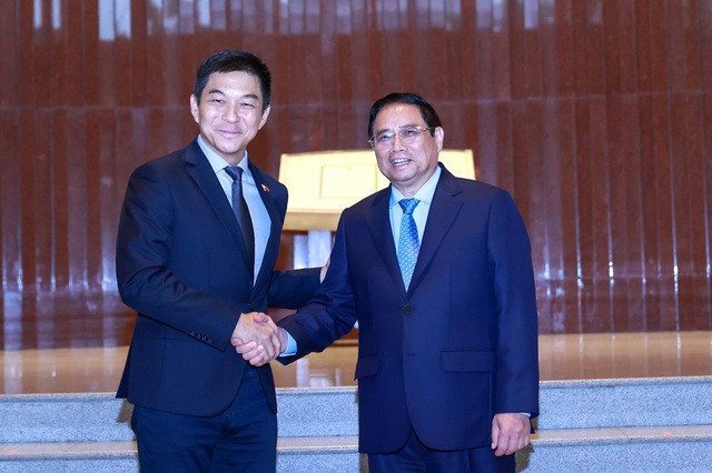 Премьер-министр Фам Минь Тьинь и Председатель Парламента Сингапура Тан Чуан-Джин. Фото: VGP Премьер-министр Фам Минь Тьинь и Председатель Парламента Сингапура Тан Чуан-Джин. Фото: VGP