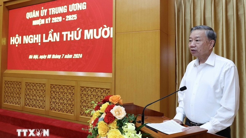 Президент То Лам выступает на конференции. Президент То Лам выступает на конференции.