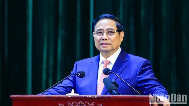 Премьер-министр Фам Минь Тьинь выступает на встрече. Фото: Чан Хай Премьер-министр Фам Минь Тьинь выступает на встрече. Фото: Чан Хай