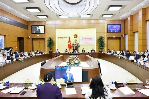 Председатель НС, глава Национального избирательного совета Чан Тхань Ман выступает на конференции. Фото: ВИА