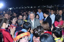 Генеральный секретарь ЦК КПВ То Лам принимает участие в мероприятии. (Фото: Данг Кхоа)