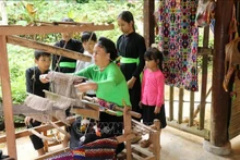 Народность Тай стремится сохранить культурную самобытность