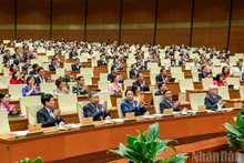 Руководители Партии и Государства, депутаты НС на закрытии сессии. Фото: Зюи Линь