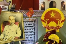 Фотография Президента Хо Ши Мина была торжественно размещена в пространстве «Вьетнам — страна и люди». Фото: Посольство Вьетнама в Венесуэле