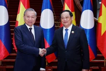 [Фото] Генеральный секретарь ЦК КПВ То Лам встретился с Премьер-министром Лаоса