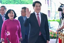 Президент Лыонг Кыонг принимает участие в мероприятии.