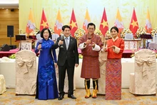 Президент Лыонг Кыонг с супругой и Король Джигме Кхесар Намгьял Вангчук с Королевой. (Фото: Тхюи Нгуен)