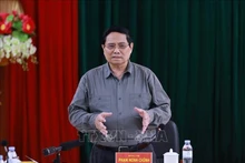 Премьер-министр Фам Минь Тьинь проводит рабочую встречу с Постоянным бюро провинциального партийного комитета Тханьхоа по вопросам социально-экономического развития. (Фото: ВИА)