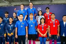 Вьетнамские спортсмены впечатляюще соревновались на чемпионате. (Фото: Вьетнамская ассоциация водных видов спорта)