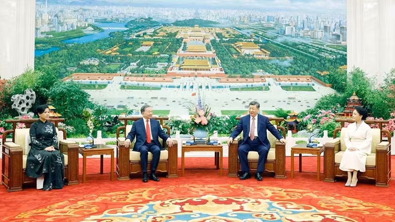 vna-potal-tong-bi-thu-chu-tich-nuoc-to-lam-va-phu-nhan-cung-tong-bi-thu-chu-tich-nuoc-tap-can-binh-va-phu-nhan-du-tiec-tra-8702812-9829.jpg