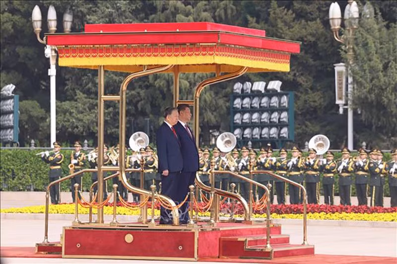 vna-potal-le-don-trong-the-tong-bi-thu-chu-tich-nuoc-to-lam-va-phu-nhan-tham-cap-nha-nuoc-den-trung-quoc-stand-1.jpg