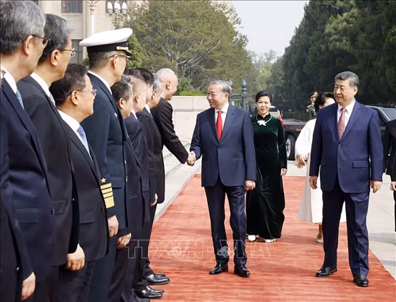 vna-potal-le-don-trong-the-tong-bi-thu-chu-tich-nuoc-to-lam-tham-cap-nha-nuoc-den-trung-quoc-stand-1.jpg