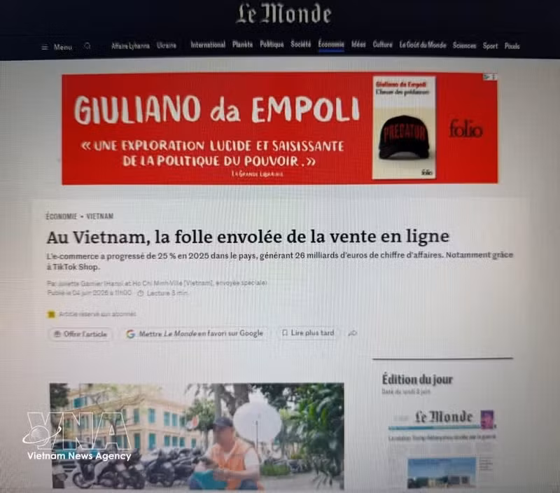 Статья французской газеты Le Monde посвящена нынешним высоким темпам роста экономики Вьетнама, в которой электронная коммерция становится не только новой потребительской тенденцией, но и важным драйвером экономического развития страны. (Фото: ВИА)