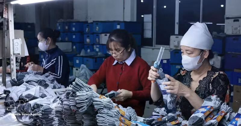 Текстильная и обувная продукция всё ещё обладает большим потенциалом на внутреннем рынке Вьетнама. Фото: ВИА