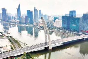 Город Хошимин ожидает, что Международный финансовый центр создаст возможности для привлечения зеленого капитала в целях реализации задач по сокращению выбросов. (Фото: Тунг Ань)