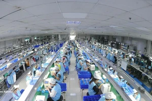Производственная линия электронной продукции в компании Suntech - промышленный кластер Тханьван. Фото: ВИА