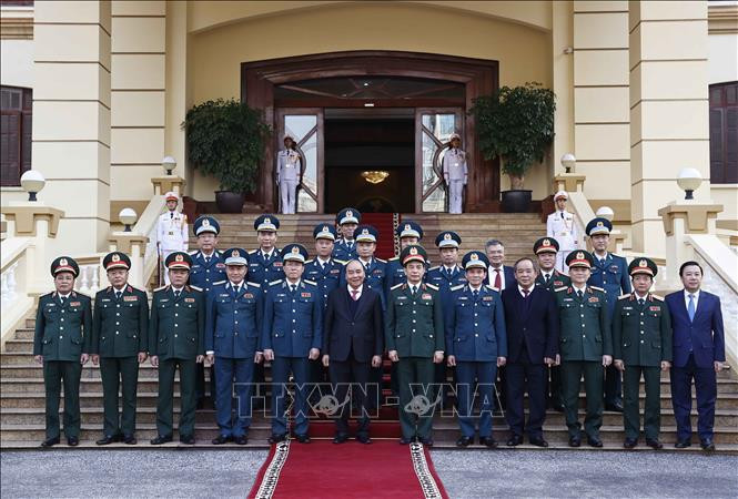 Президент Нгуен Суан Фук и участники встречи. Фото: ВИА