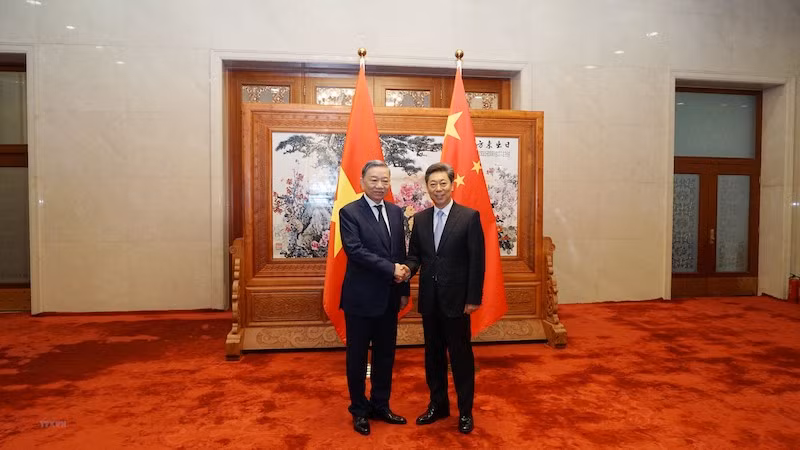 Министр общественной безопасности То Лам и Секретарь Политико-юридической комиссии ЦК Коммунистической партии Китая Чэнь Вэньцин. Фото: ВИА