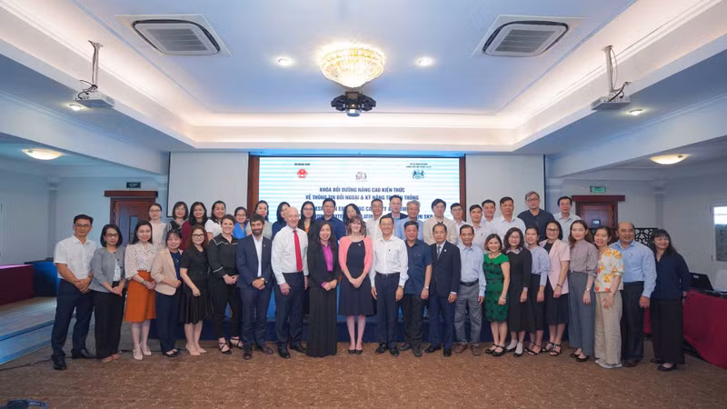 Участники мероприятия. Фото: baoquocte.vn