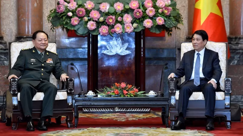 Президент Лыонг Кыонг и член Политбюро, Заместитель председателя Центрального военного совета Китая генерал-полковник Чжан Юся. Фото: Данг Кхоа