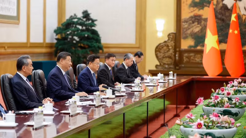 Китайская делегация на встрече. Фото: Нят Бак