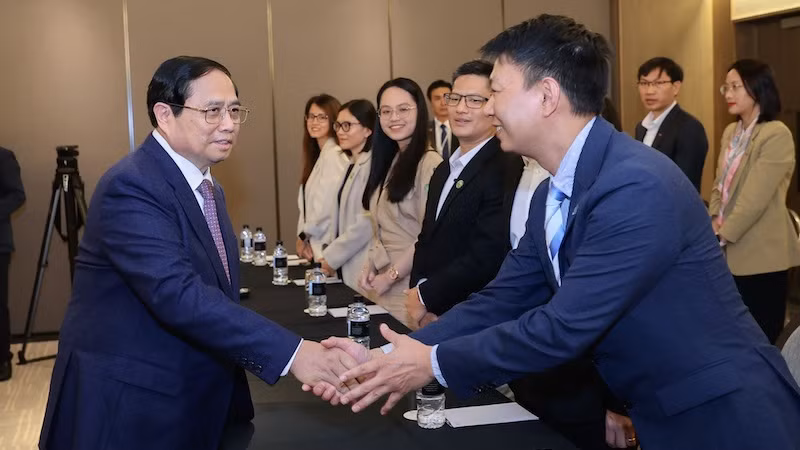 Премьер-министр Фам Минь Тьинь и вьетнамские ученые в Новой Зеландии. Фото: ВИА
