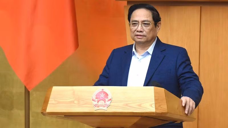 Премьер-министр Фам Минь Тьинь выступает на заседании. Фото: Чан Хай