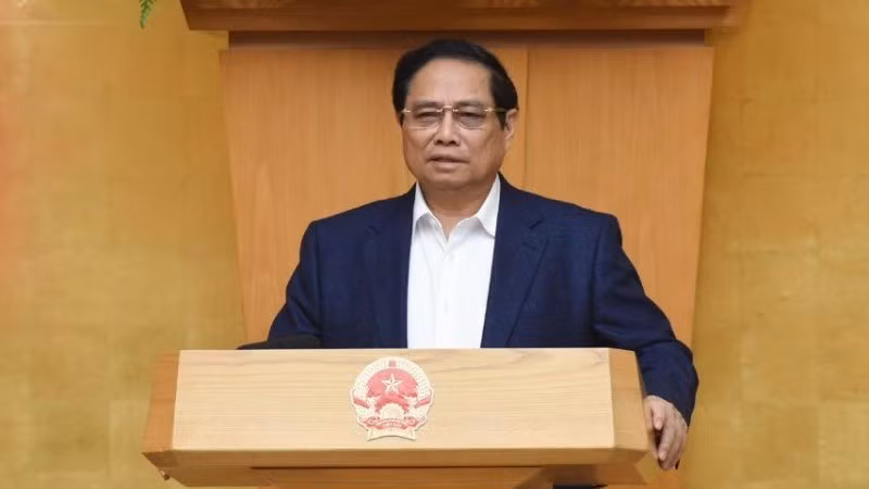 Премьер-министр Фам Минь Тьинь выступает на конференции. Фото: Чан Хай