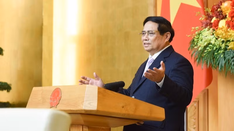 Премьер-министр Фам Минь Тьинь выступает на беседе. Фото: Чан Хай