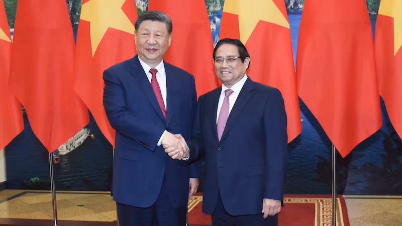 Премьер-министр Фам Минь Тьинь и Генеральный секретарь ЦК КПК, Председатель Си Цзиньпин. Фото: Чан Хай