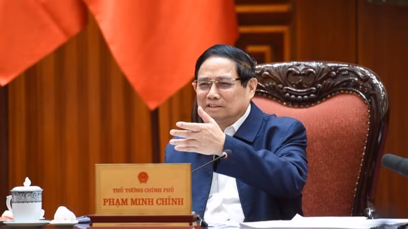 Премьер-министр Фам Минь Тьинь выступает на заседании. Фото: Чан Хай