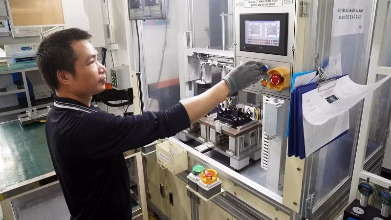 Производство запасных частей для мотоциклов в ООО «A-TECH AUTOMOTIVE Vietnam» в промышленном парке Камдиен провинции Хайзыонг. Фото: Данг Ань