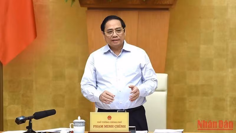 Премьер-министр Вьетнама Фам Минь Тьинь выступает с речью. Фото: Чан Хай 