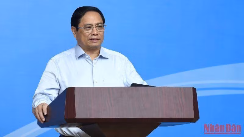 Премьер-министр Вьетнама Фам Минь Тьинь выступает на конференции. Фото: Чан Хай 