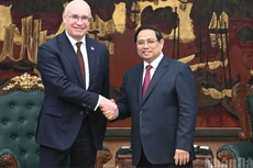 Премьер-министр Фам Минь Тьинь и генеральный директор ТАСС Андрей Кондрашов. Фото: Чан Хай