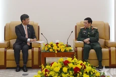 Генерал армии Фан Ван Жанг и Посол Индии во Вьетнаме Церинг В. Шерпа. Фото: qdnd.vn