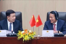 Министр общественной безопасности Вьетнама Лыонг Там Куанг и Министр общественной безопасности Китая Ван Сяохун на конференции. Фото: ВИА