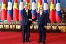 Генеральный секретарь ЦК КПВ То Лам и Председатель НА Лаоса Сайсомфон Фомвихан. Фото: ВИА