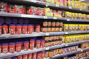 Продукция на основе какао представлена на полке супермаркета в Алжире. Фото: ВИА