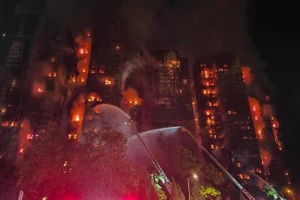 Пожар в Гонконге. Фото: Синьхуа