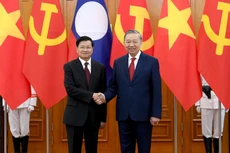 [Фото] Генеральный секретарь ЦК КПВ То Лам провел переговоры с Генеральным секретарем ЦК НРПЛ, Президентом Лаоса