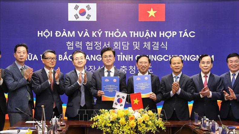 Церемония подписания соглашения о сотрудничестве между двумя местностями. Фото: ВИА Церемония подписания соглашения о сотрудничестве между двумя местностями. Фото: ВИА