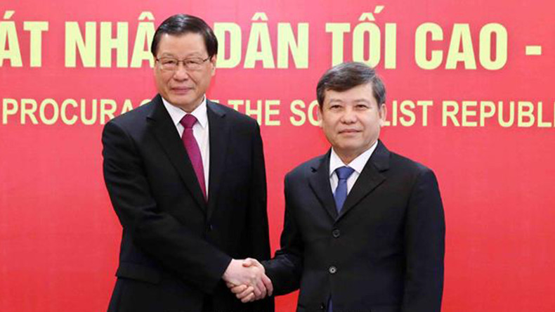 Генеральный прокурор Верховной народной прокуратуры Ле Минь Чи (справа) и Генеральный прокурор Верховной народной прокуратуры Китая Ин Юн. Фото: ВИА Генеральный прокурор Верховной народной прокуратуры Ле Минь Чи (справа) и Генеральный прокурор Верховной народной прокуратуры Китая Ин Юн. Фото: ВИА