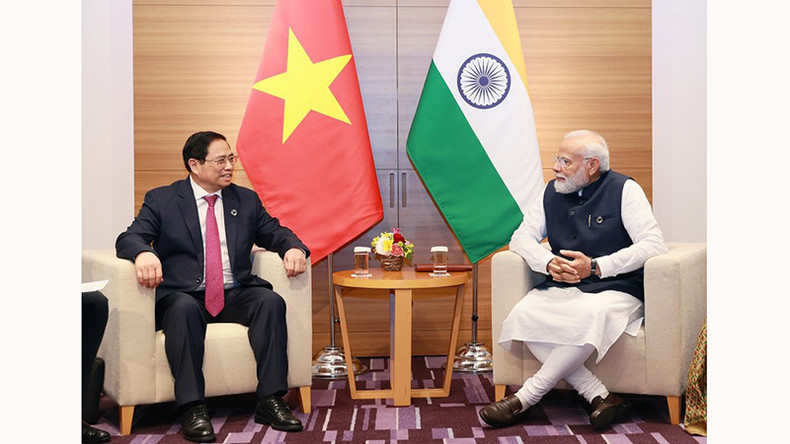 Премьер-министр Фам Минь Тьинь и Премьер-министр Индии Нарендра Моди. Фото: Зыонг Жанг Премьер-министр Фам Минь Тьинь и Премьер-министр Индии Нарендра Моди. Фото: Зыонг Жанг